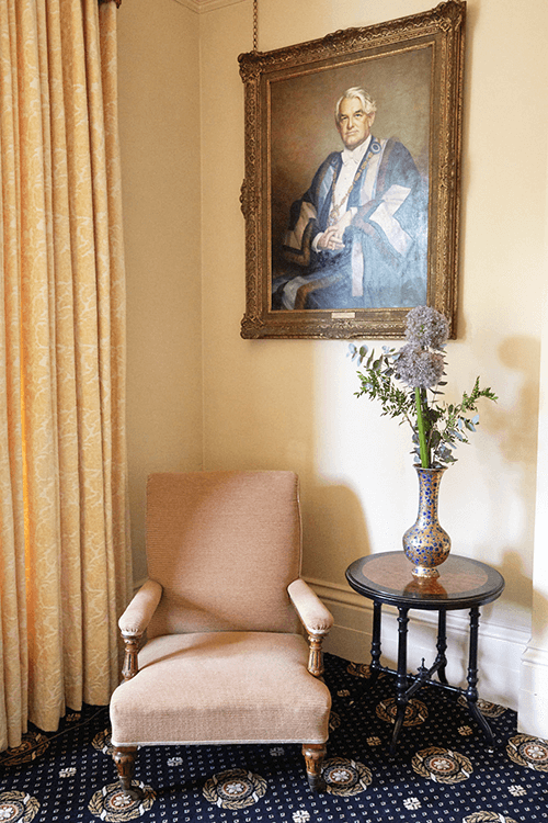 Bergére chair, restored and re- upholstered for the Mansion House, Clifton, Bristol next to replacement chenille damask curtains. - i.d.space